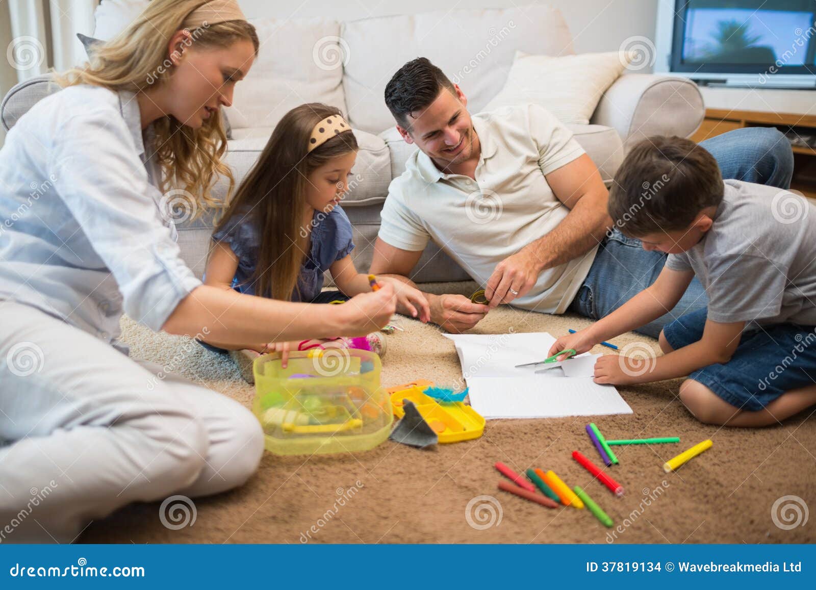 Family Assisting Boy in Drawing Stock Photo - Image of lifestyle, love