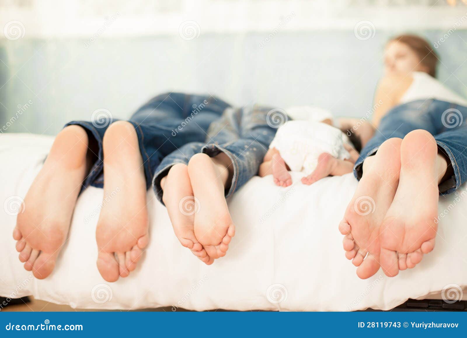 Pictures of Families Their Feet in the Bed