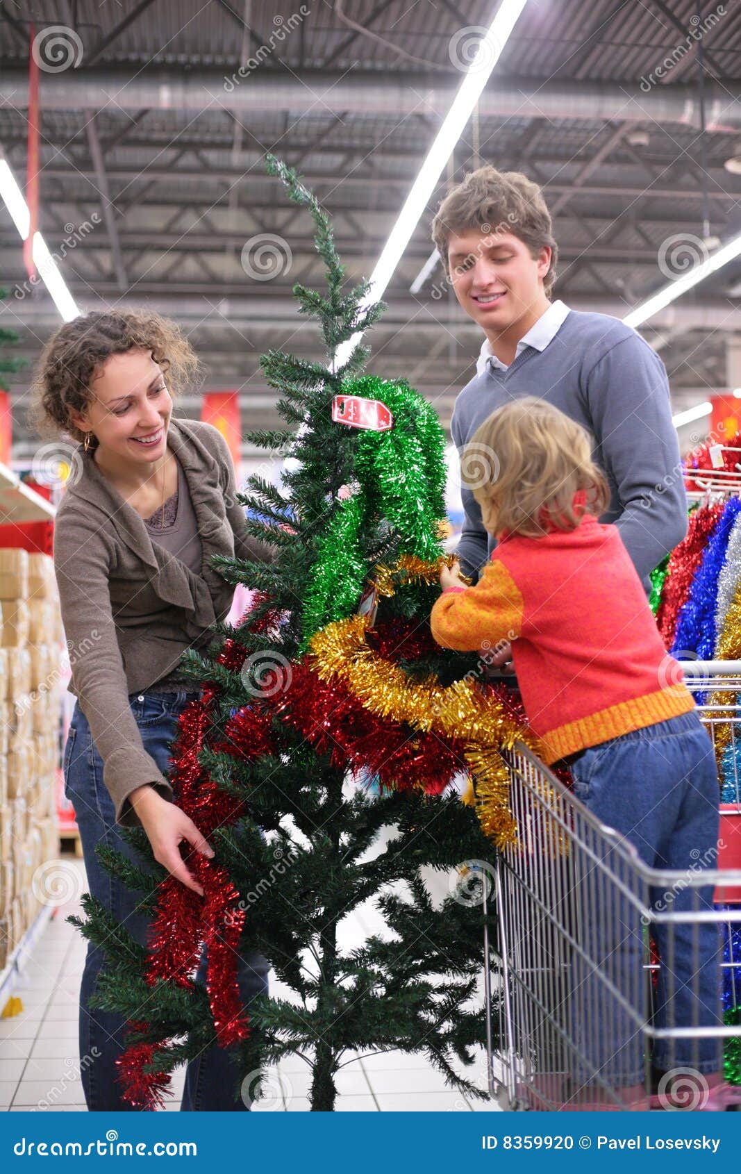 Family Buys Christmastree with Decorations Stock Photo Image of