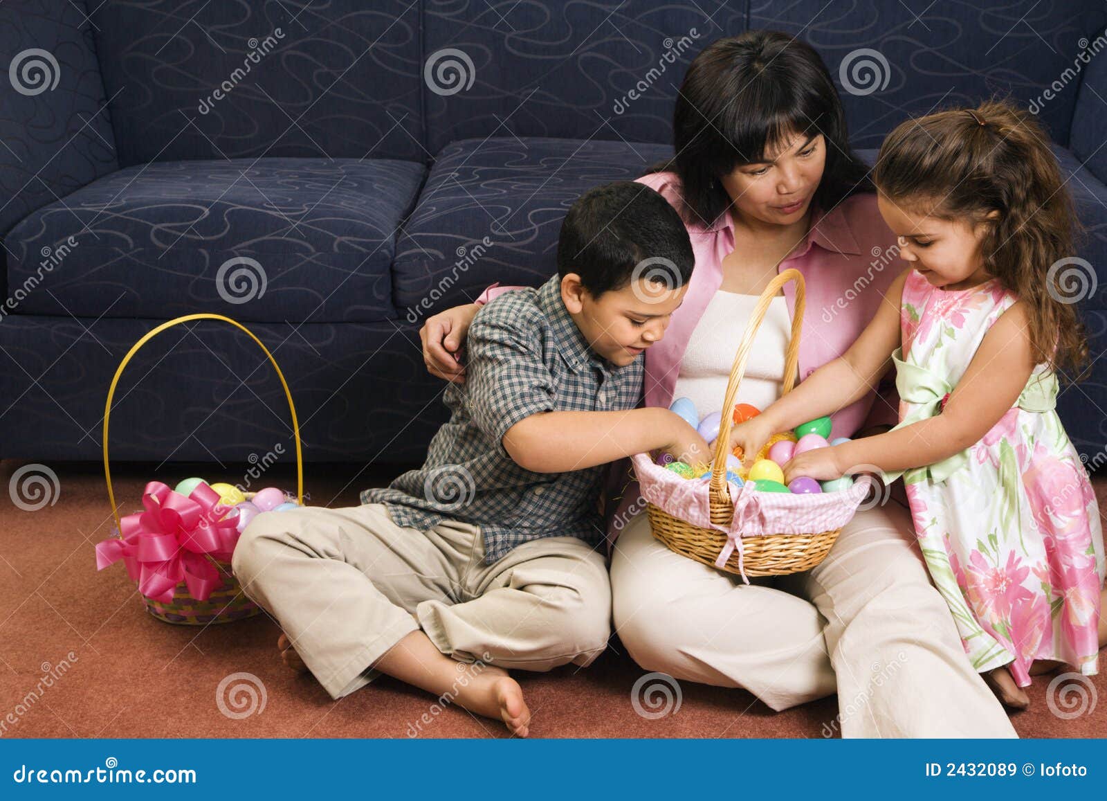 Family celebrating Easter. stock image. Image of eggs 2432089