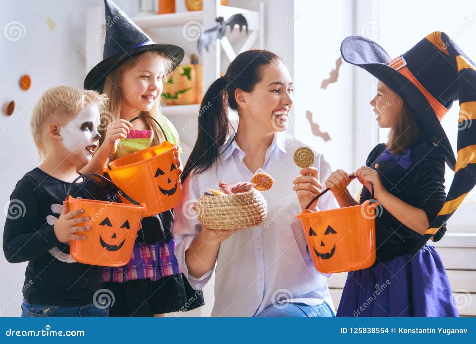 Family Celebrating Halloween Stock Photo - Image of celebration, people ...