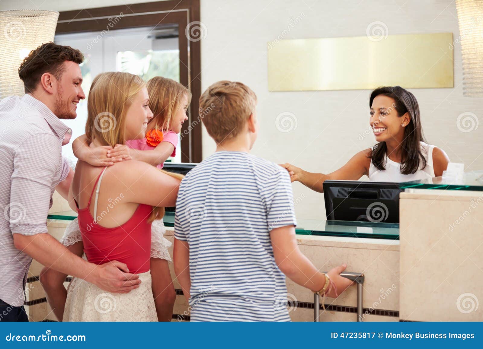 Family Checking in at Hotel Reception Stock Image Image of vacation, woman 47235817
