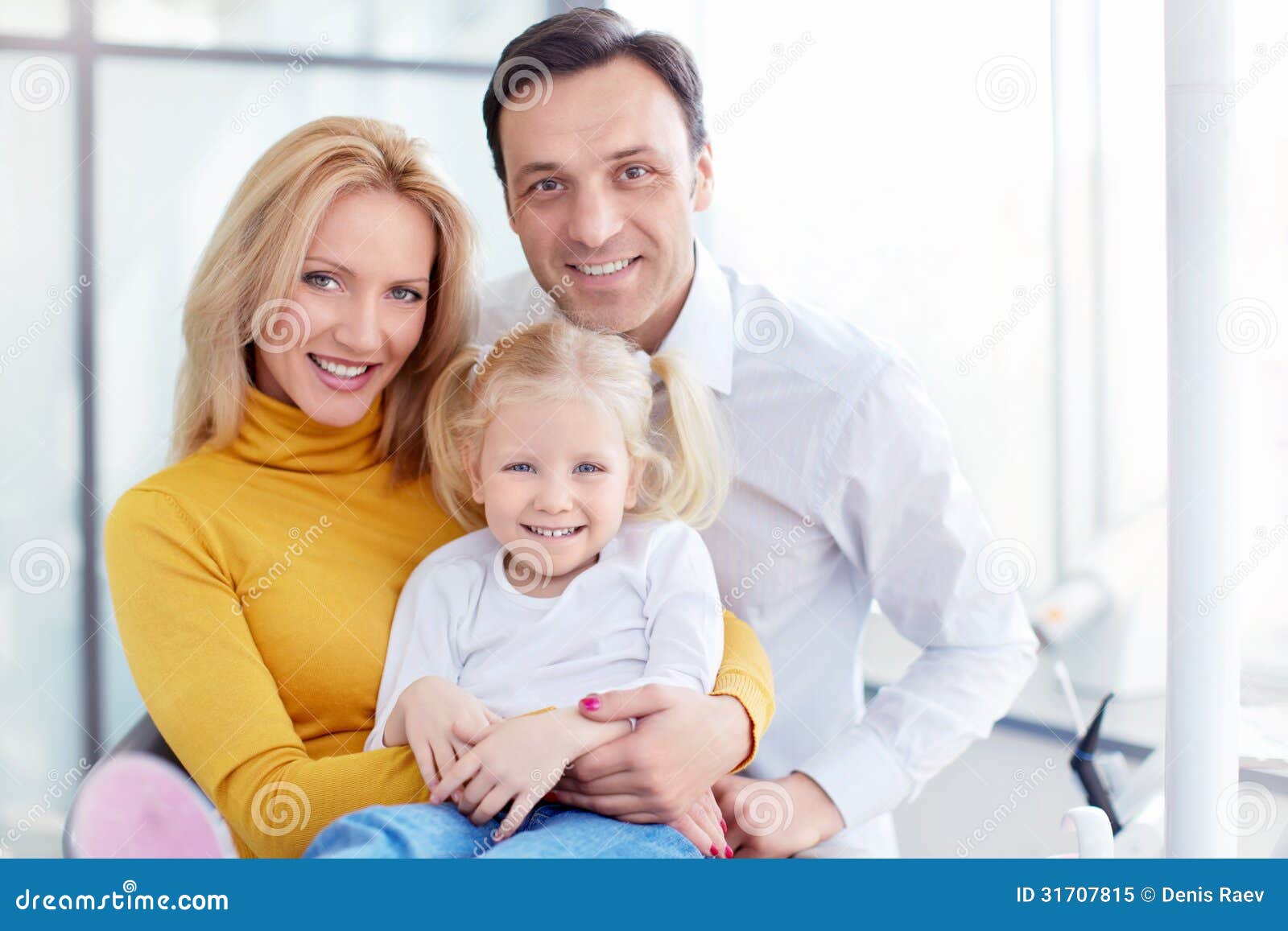 family in dental clinic