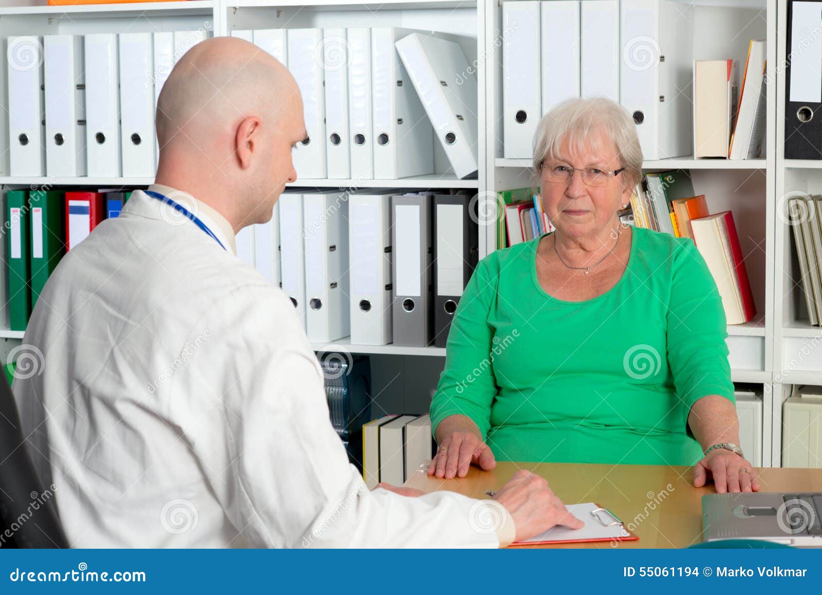 Family Doctor Examine A Female Senior Stock Photo - Image ...