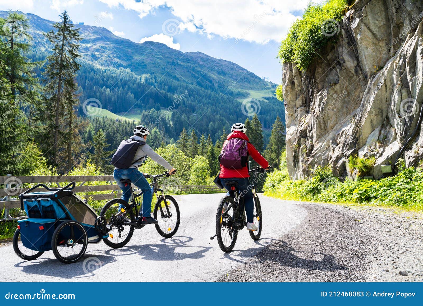 Family with E Bike MTB and Kid Trailer Stock Image Image of mountain