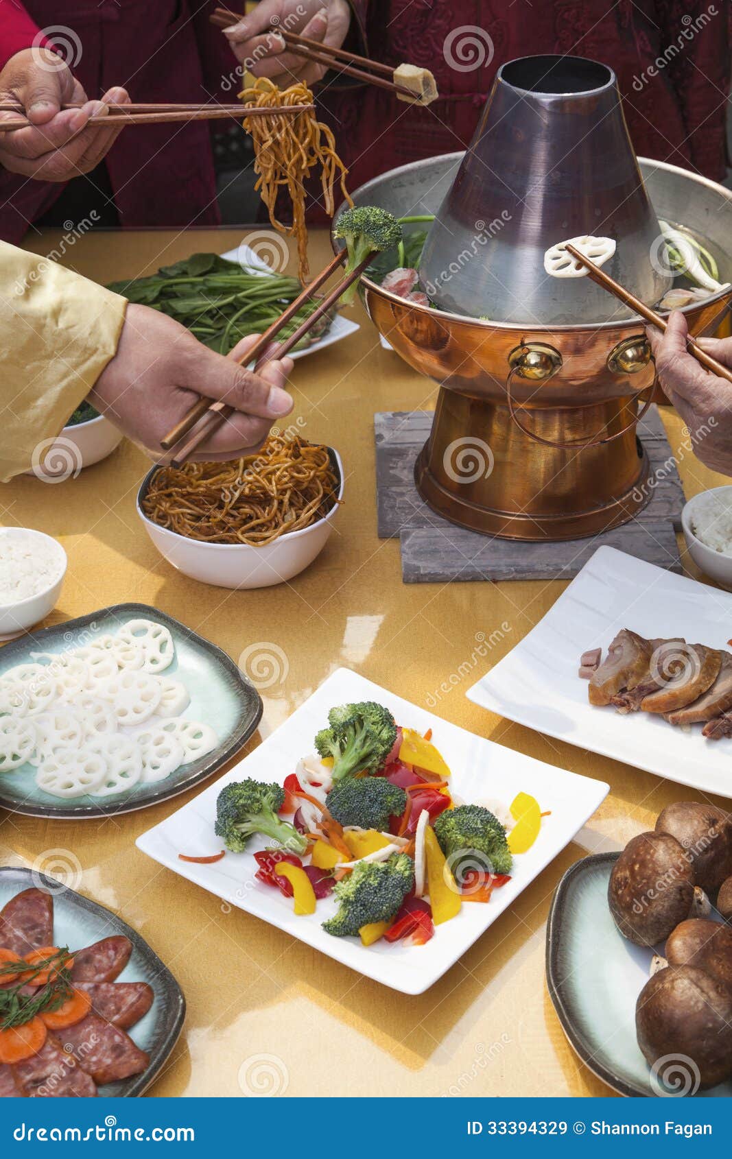 Family Eating Chinese Hot Pot, Hands only Stock Image Image of