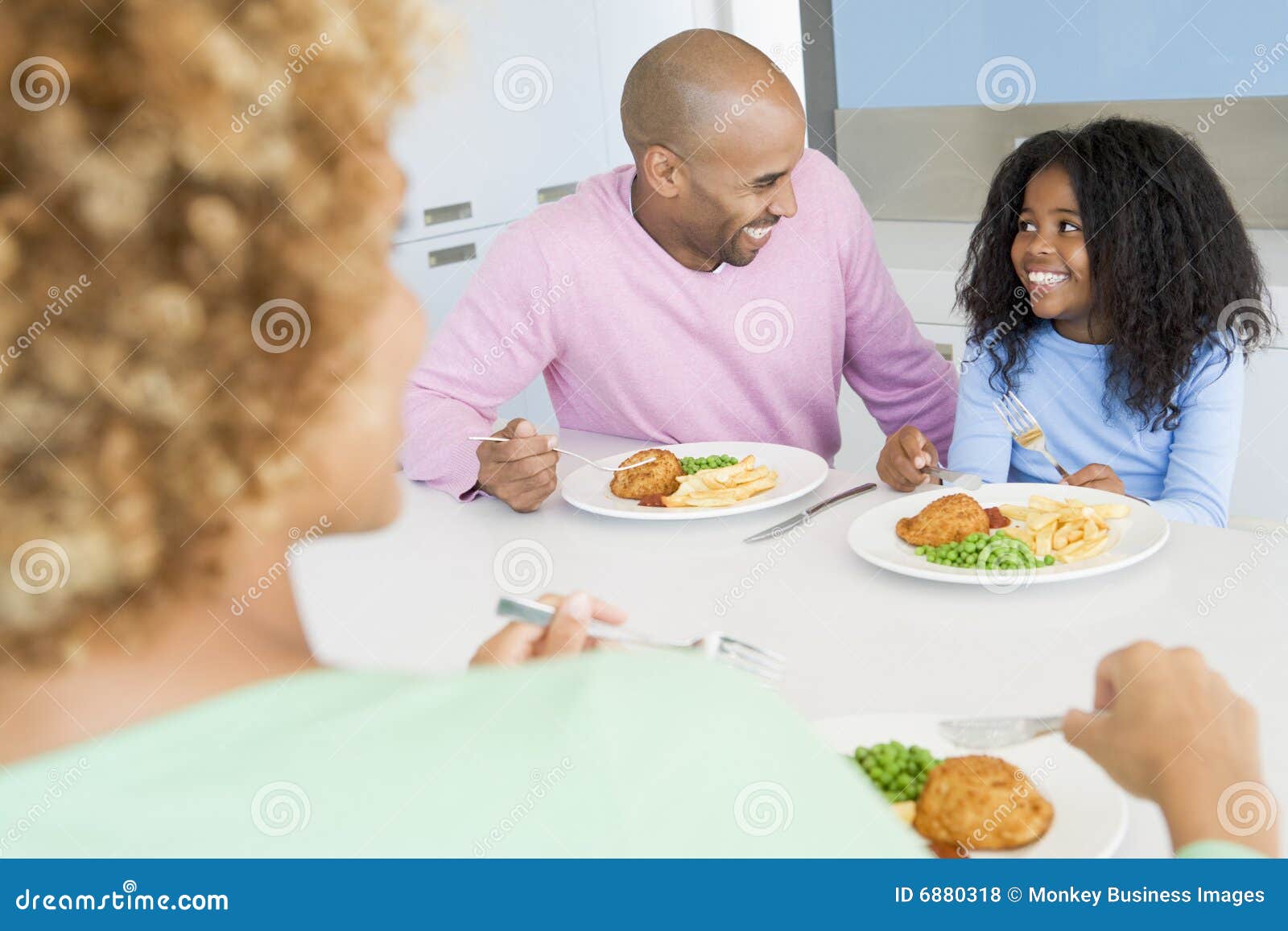 family eating a meal,mealtime together