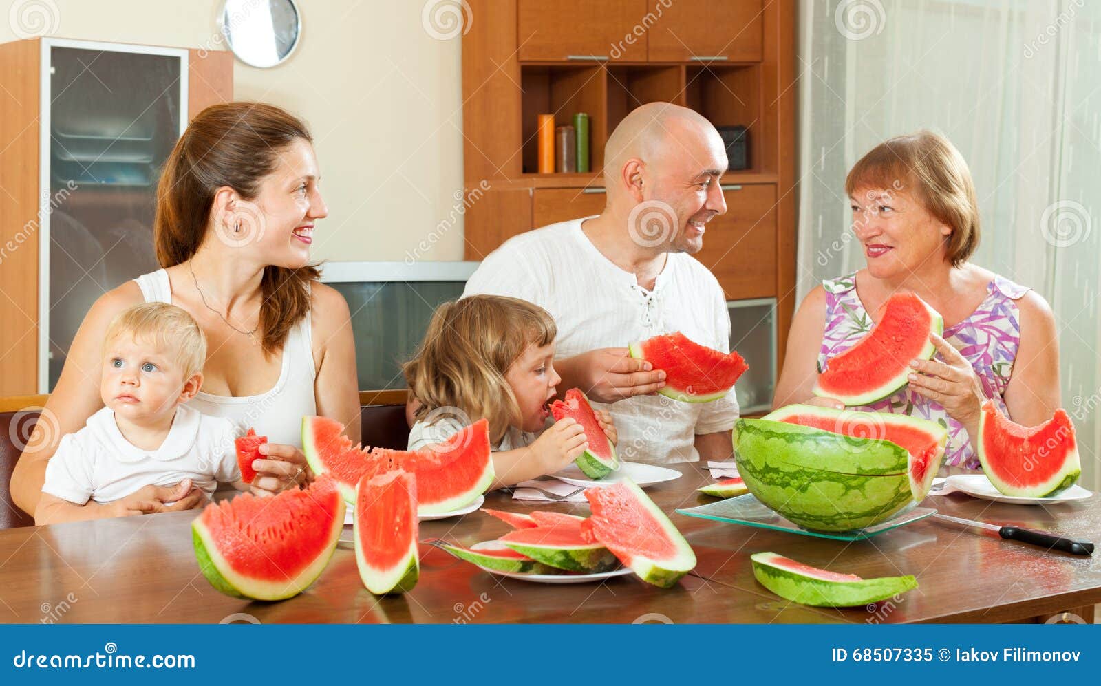 Family Eating Watermelon at Home Stock Image Image of happy, female