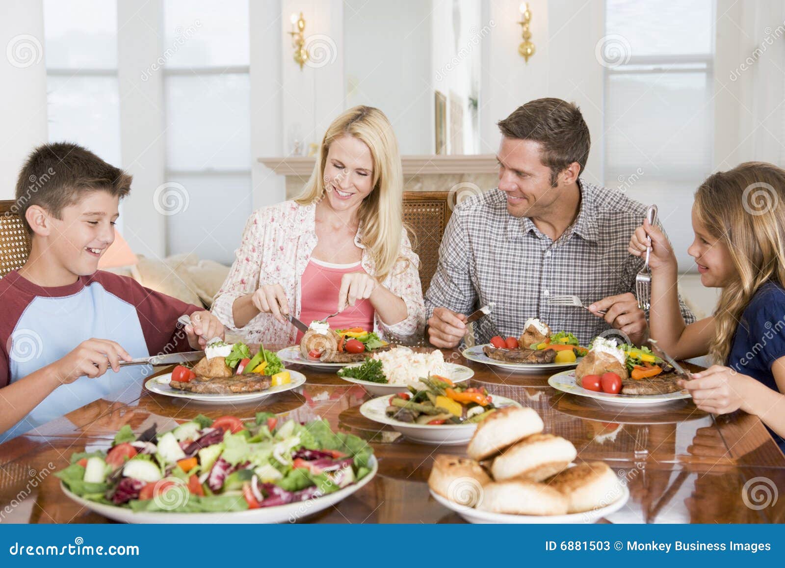 family enjoying meal, mealtime together