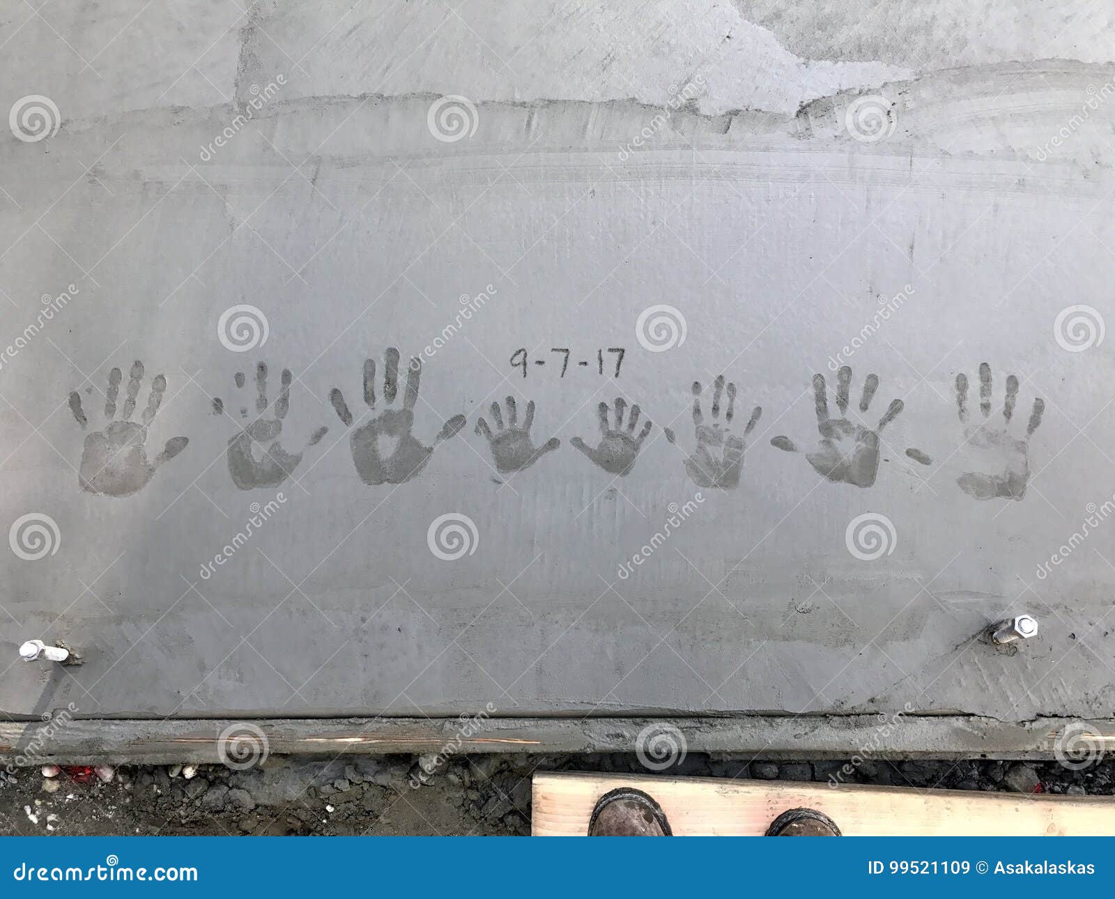 Family Handprints in Fresh Concrete Stock Image Image of hands, build