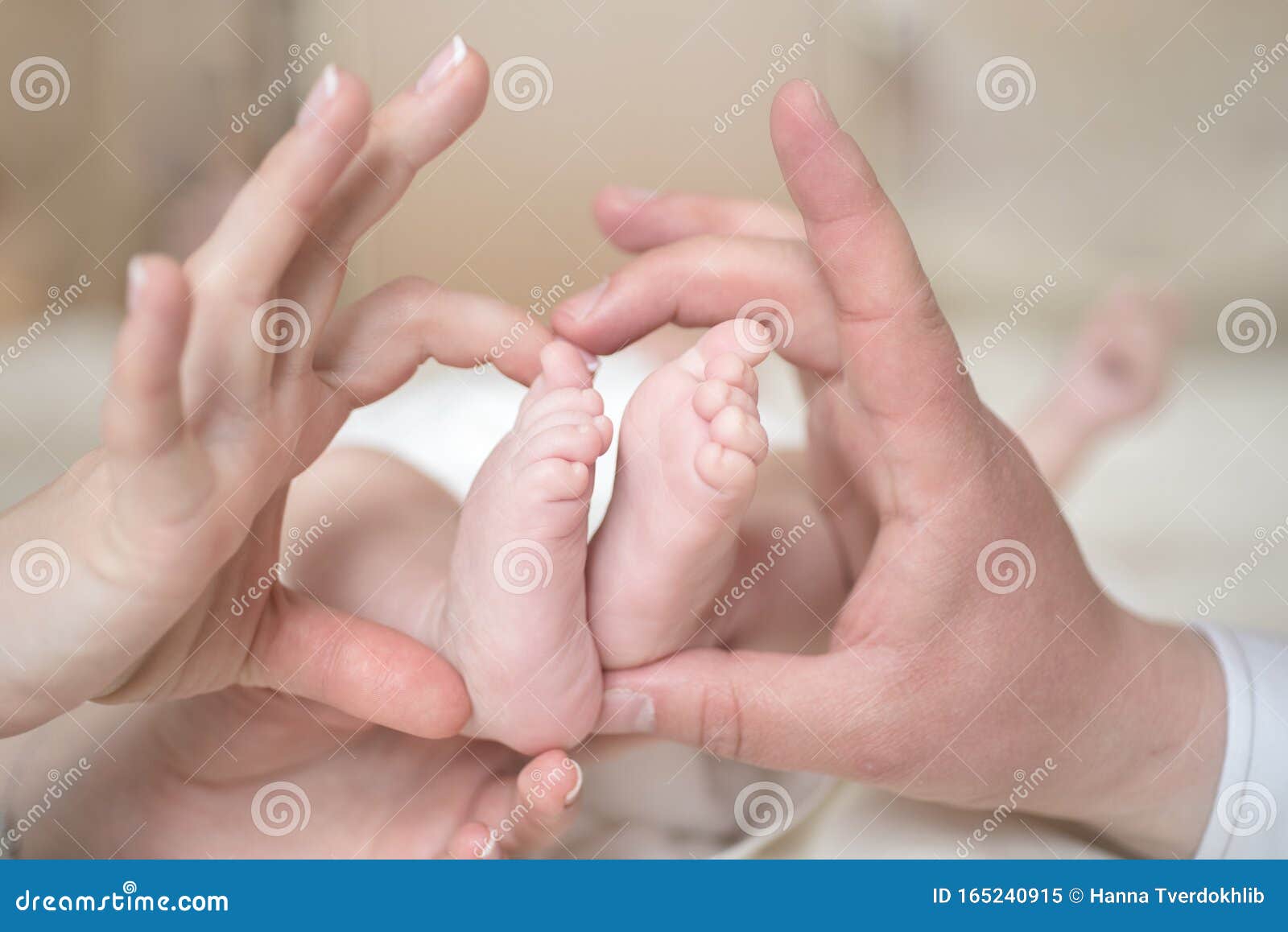 family happy moments. new born foot photo sesion. parents with baby .