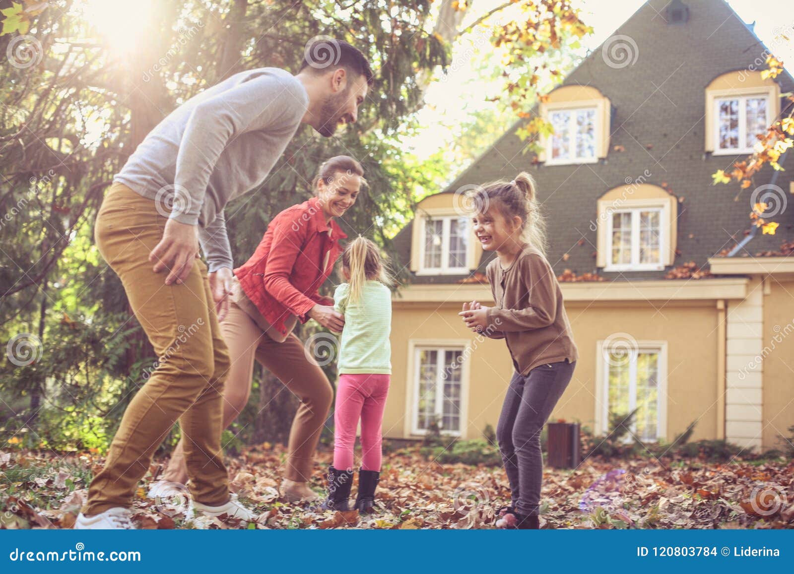 Family Have Fun Together At Backyard On The Move Stock Photo Image Of Children