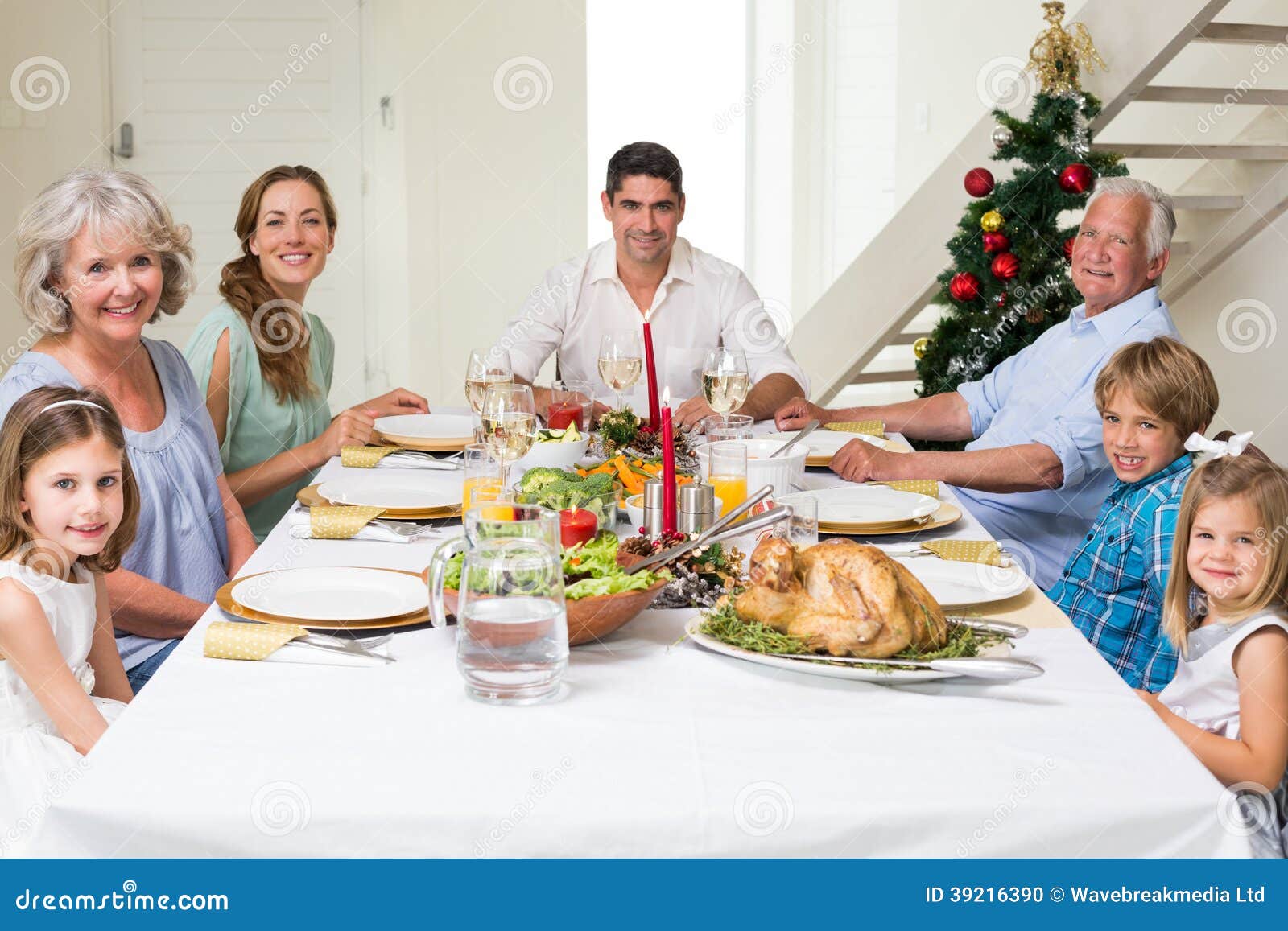 Family Having Christmas Meal Together Stock Photo - Image of mature ...