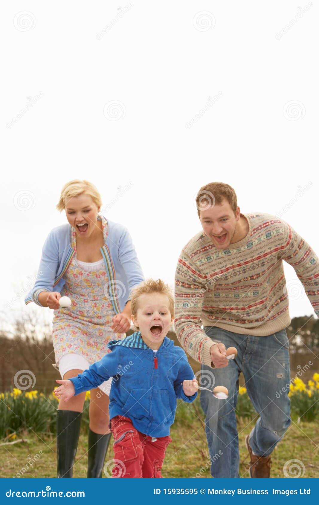 family having egg and spoon race