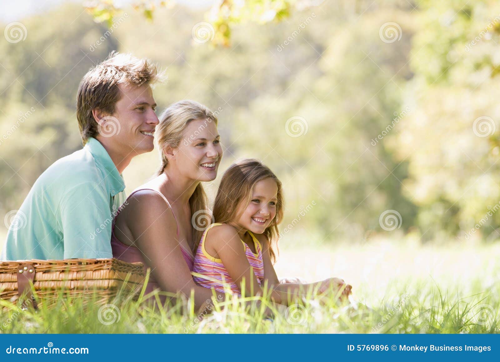 Family having park picnic smiling. Family forward having looking park picnic smiling