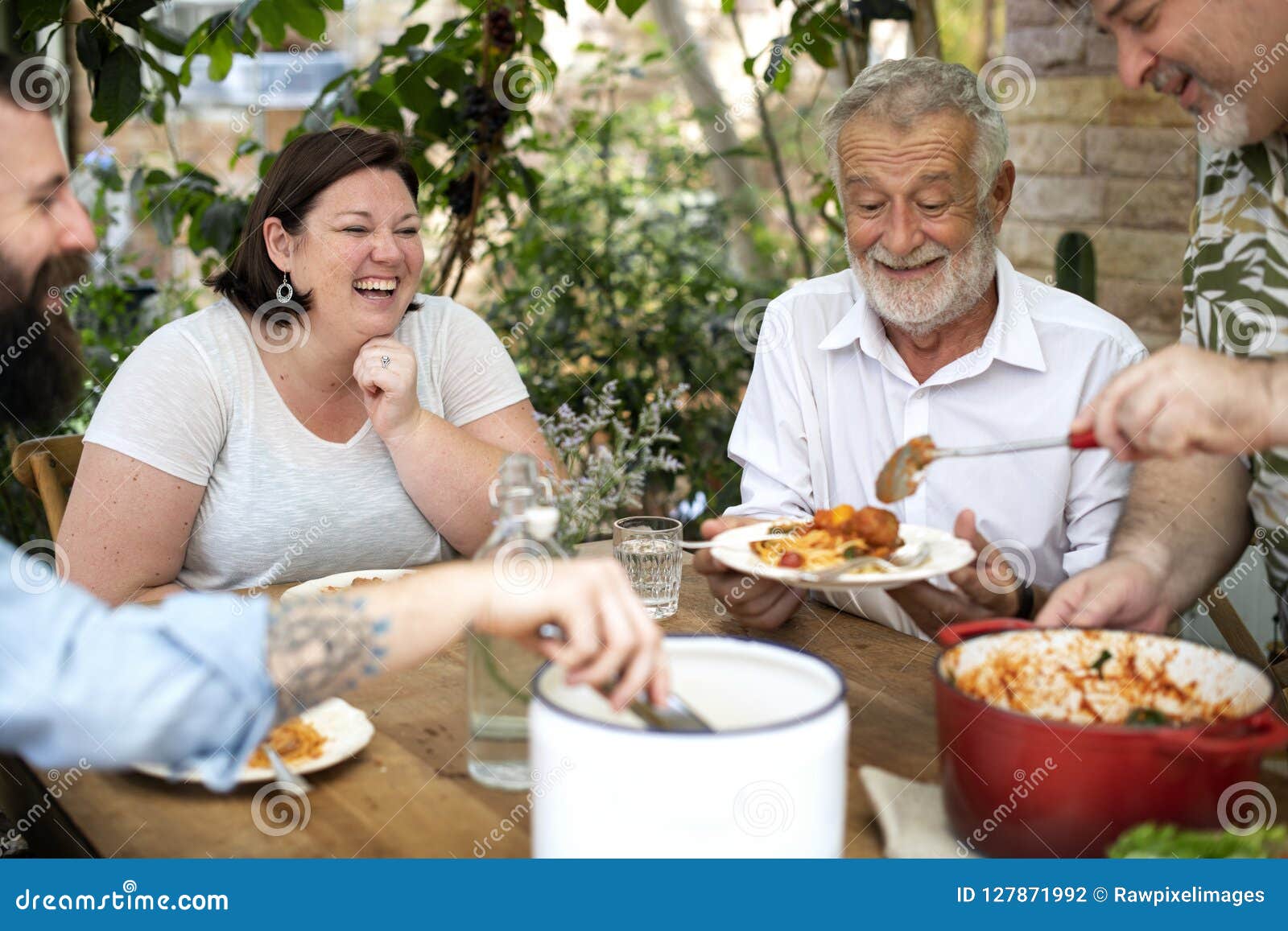 Family Having a Pasta Dinner Stock Photo - Image of senior, meal: 127871992