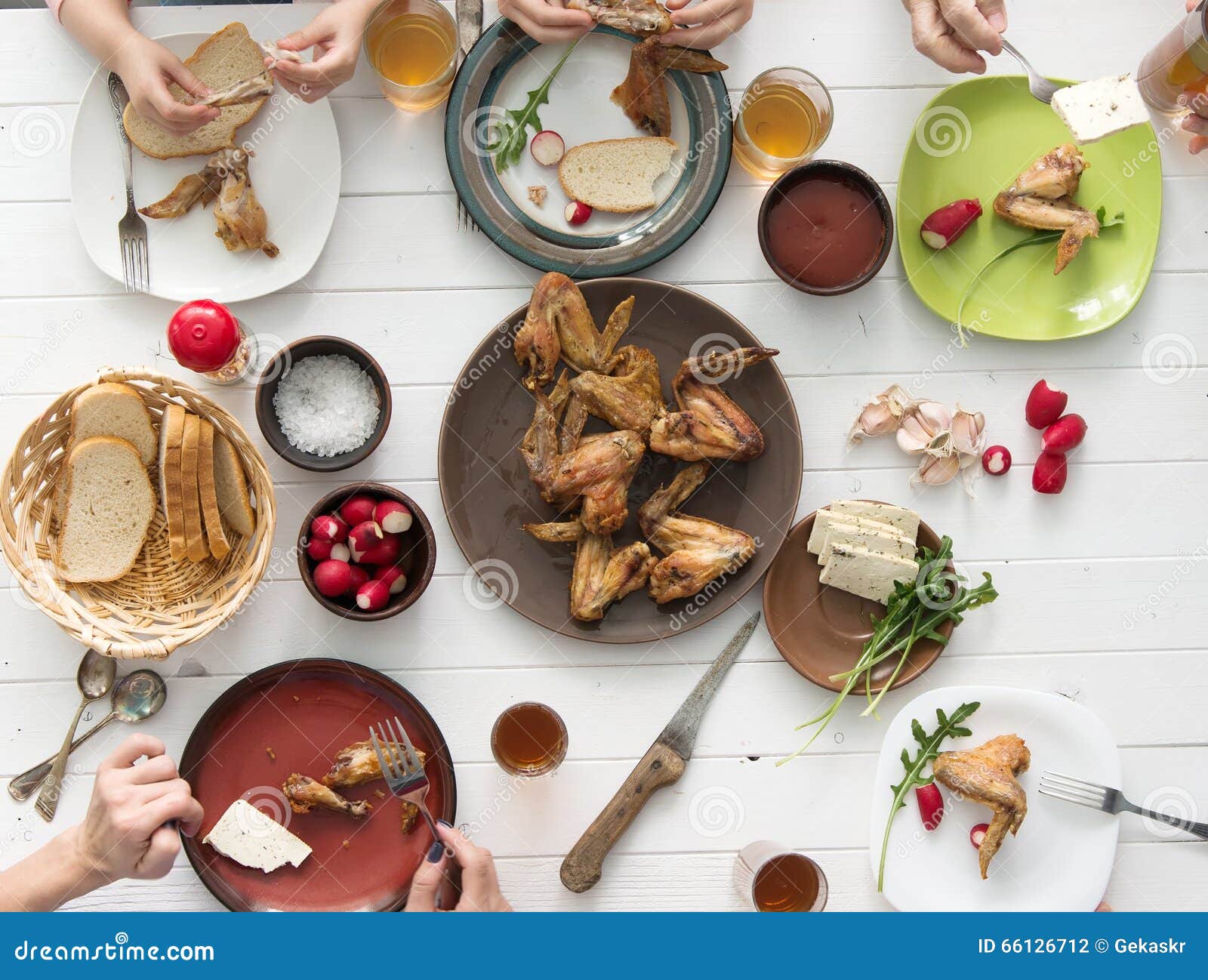 Family Having Roasted Chicken Wings for Dinner Stock Photo Image of