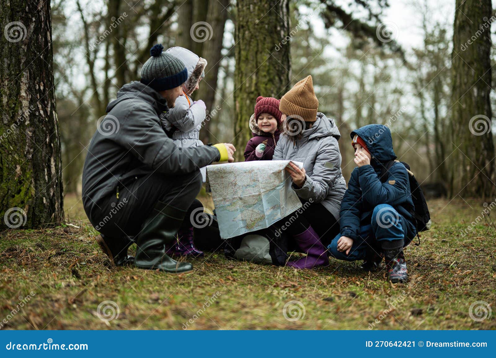 Family and Kids with Map in the Forest Stock Image - Image of kids