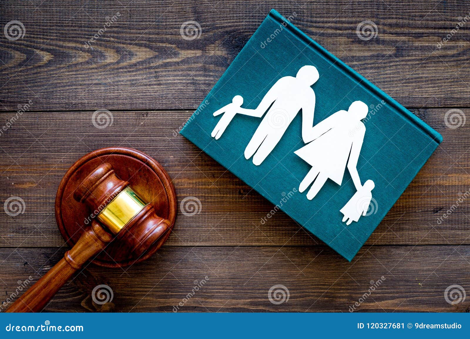 family law, family right concept. child-custody concept. family with children cutout near court gavel on dark wooden