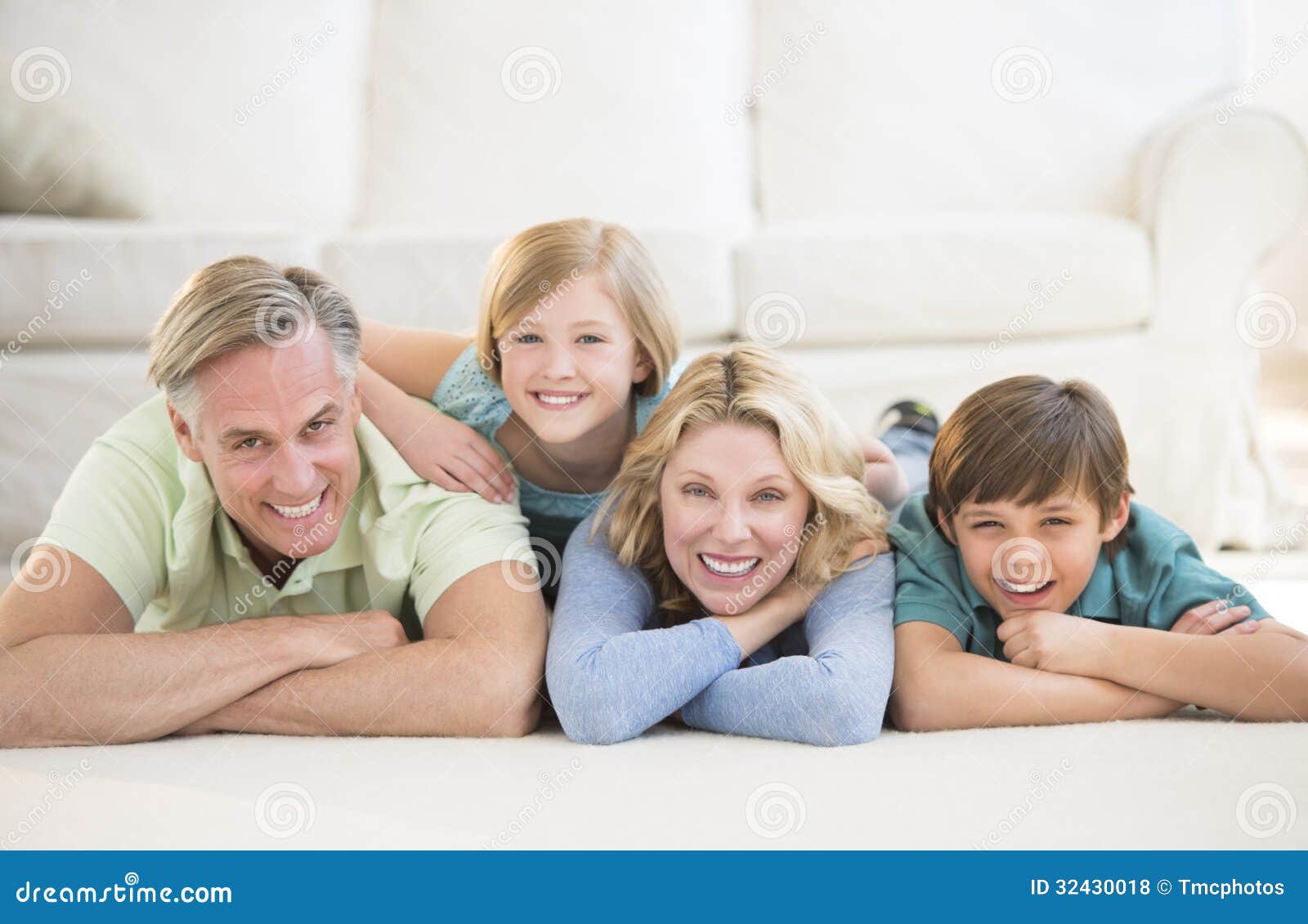 family lying in living room
