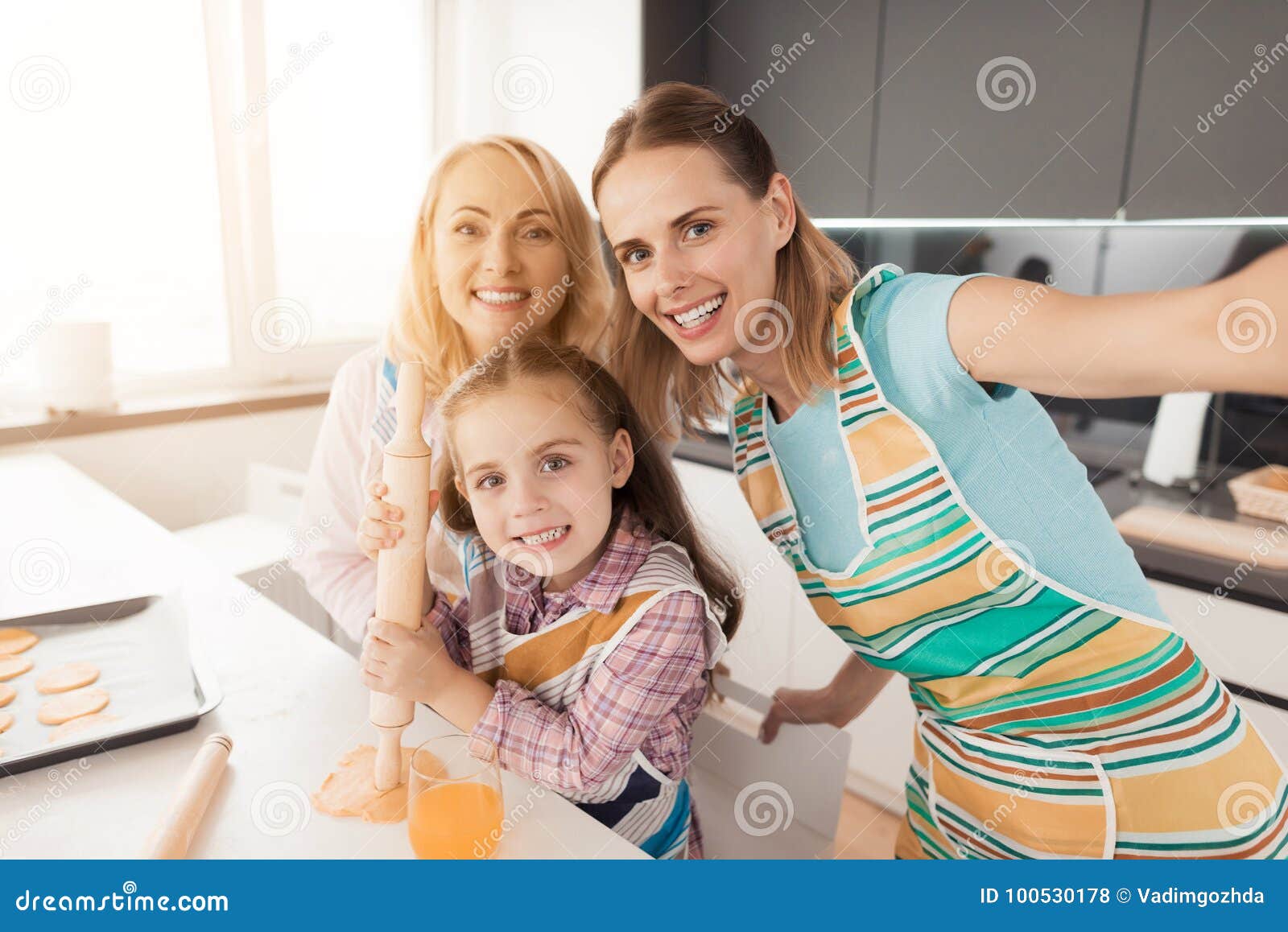 Family Makes Selfies for Thanksgiving in the Kitchen while Cooking Food ...