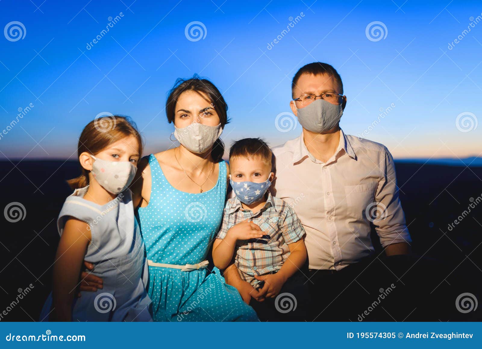 family in masks during pandemia