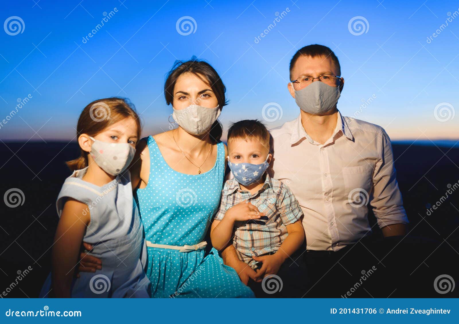 family in masks during pandemia