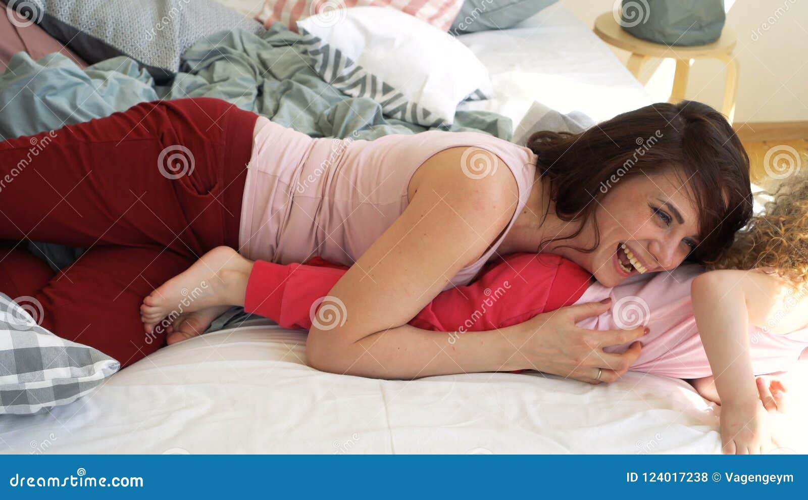 Family, Mother and Daughter are Fooling Around on Bed Stock Footage