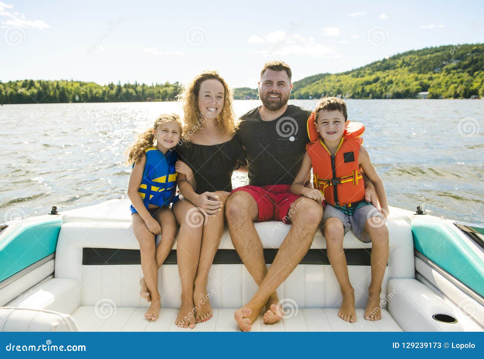 family out boating together having fun on vacancy