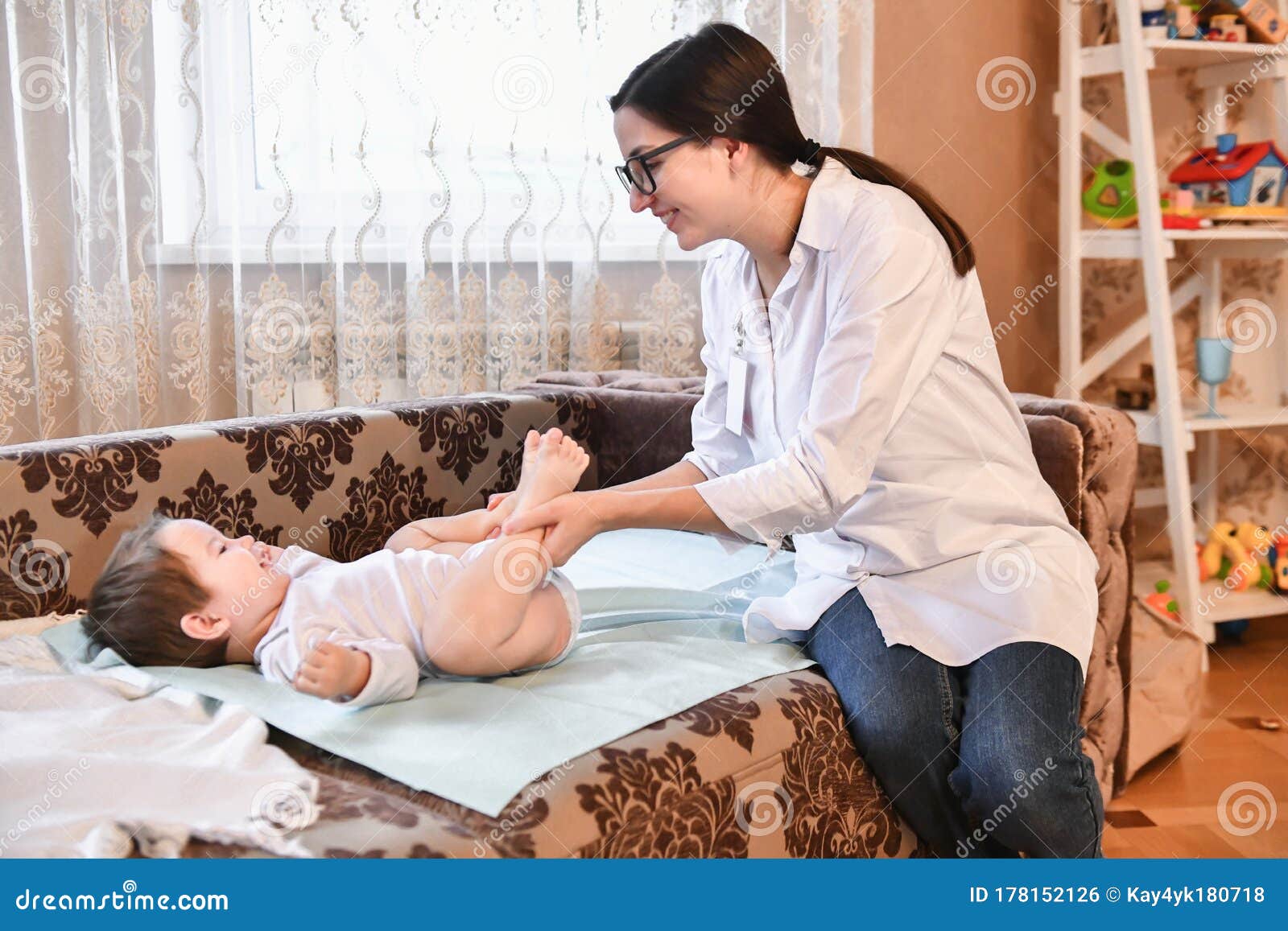 family pediatrician doctor family doctors home visit to a sick child