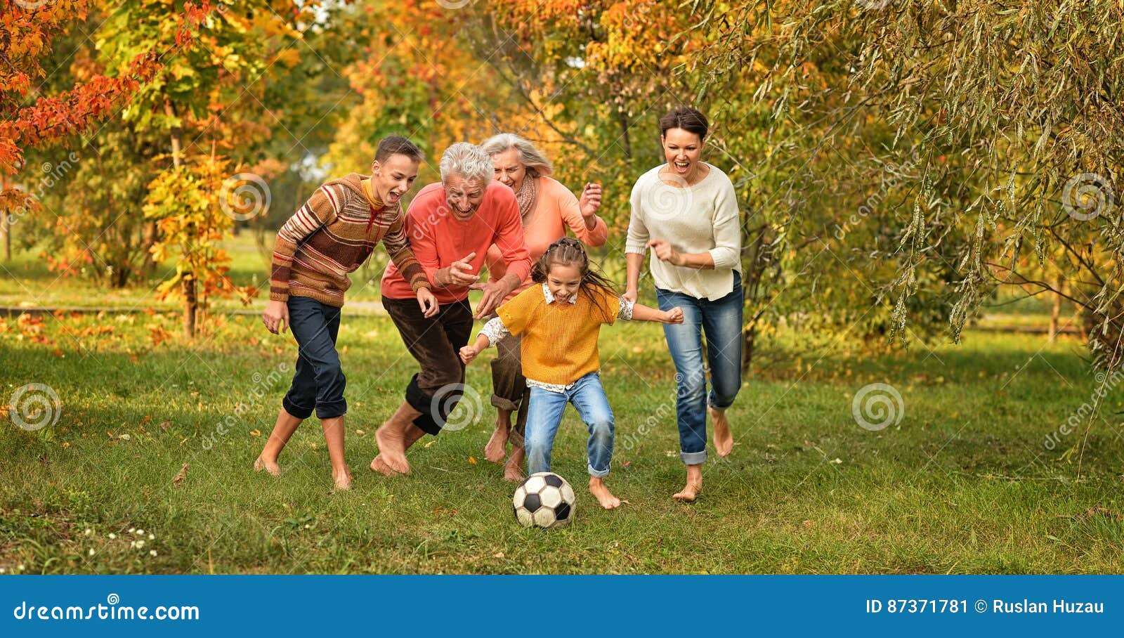 family playing football