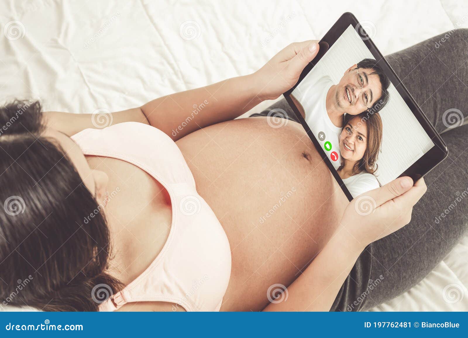 Family and Pregnant Woman Video Call while Stay Safe at Home during Covid-19 Stock Image