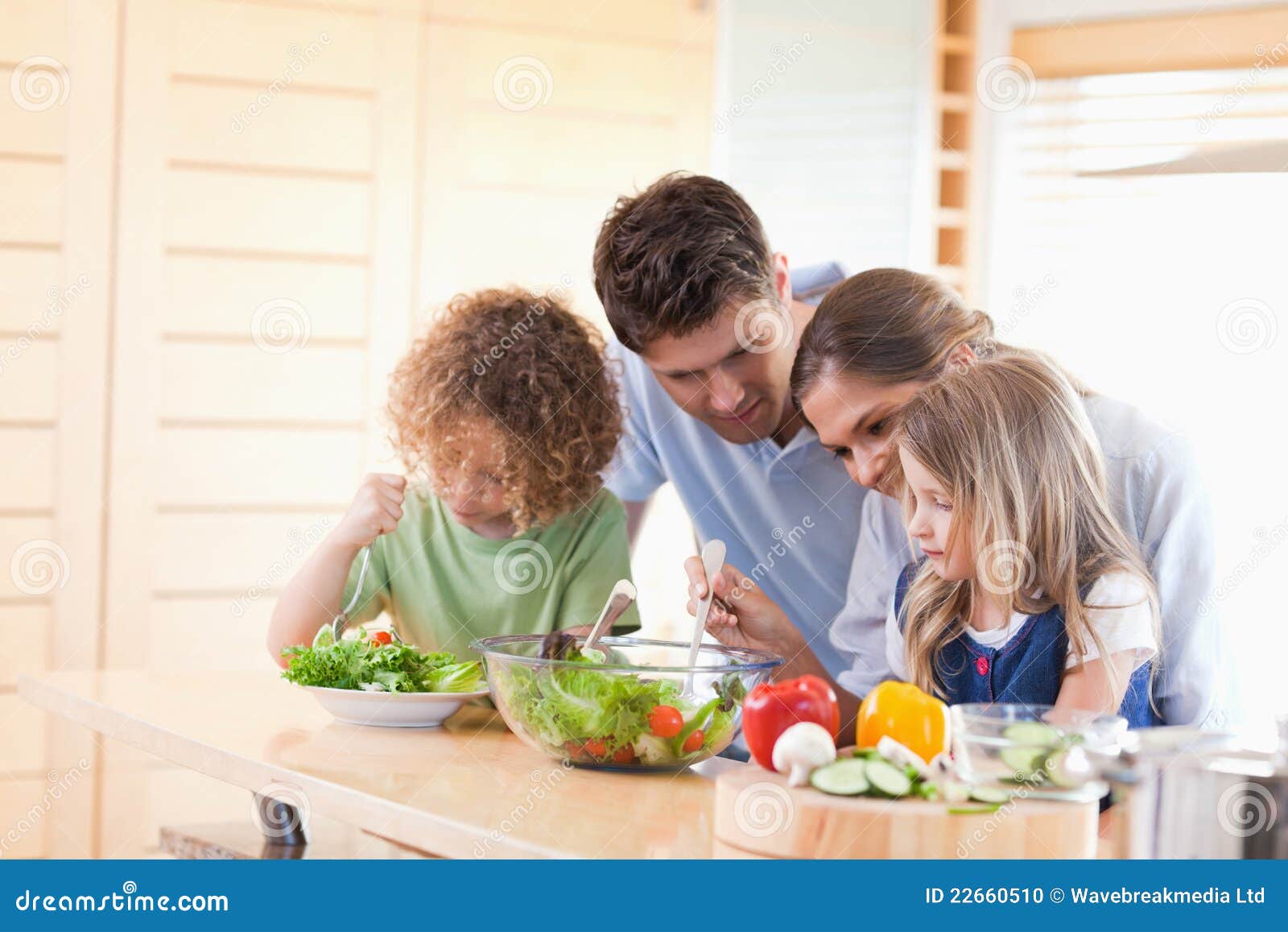 Family Preparing a Salad Together Stock Photo Image of caucasian