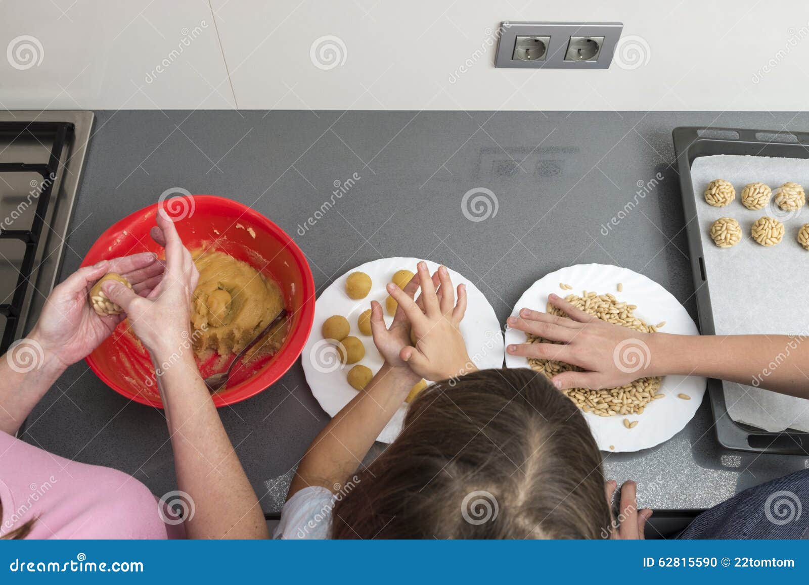 family preparing sweets in the kitchen