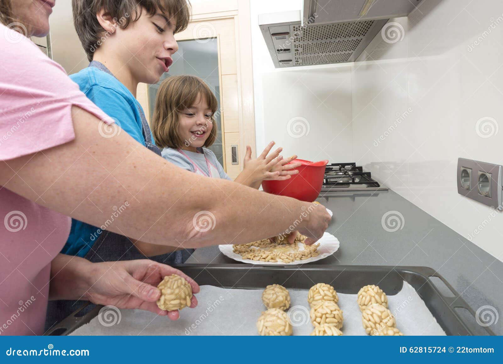 family preparing sweets in the kitchen