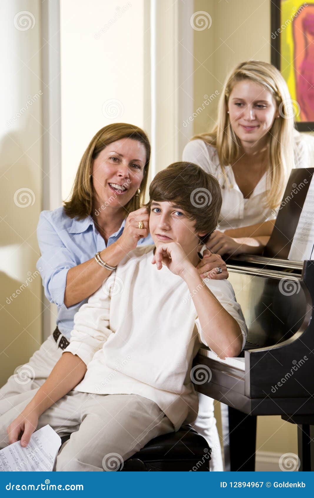 Family Sitting On Piano Bench, Mother Teasing Son Royalty Free Stock ... amateur hq image Family Sitting On Piano Bench, Mother Teasing Son Royalty Free Stock ... image
