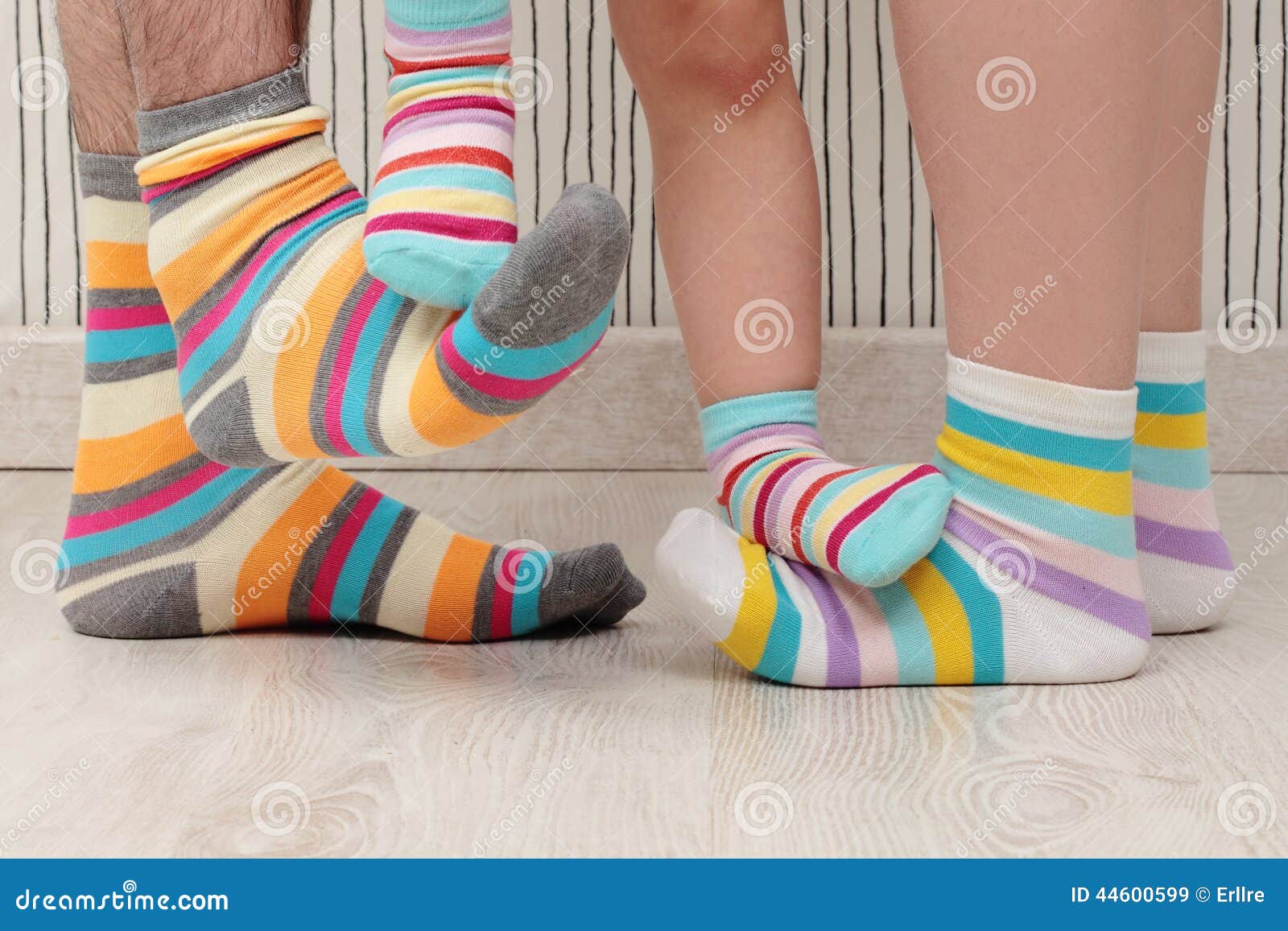 Family in socks stock image. Image of togetherness, adult - 44600599