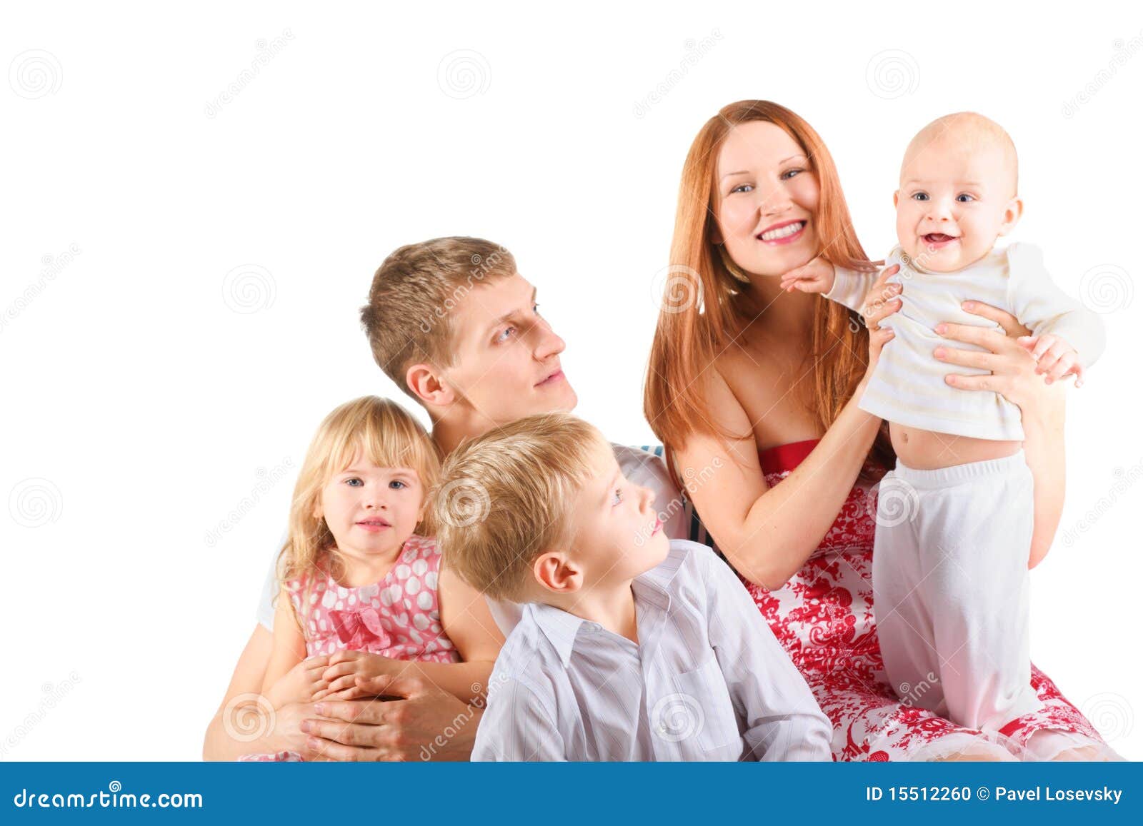 Family with Three Children is Sitting on a Chair. Stock Photo Image