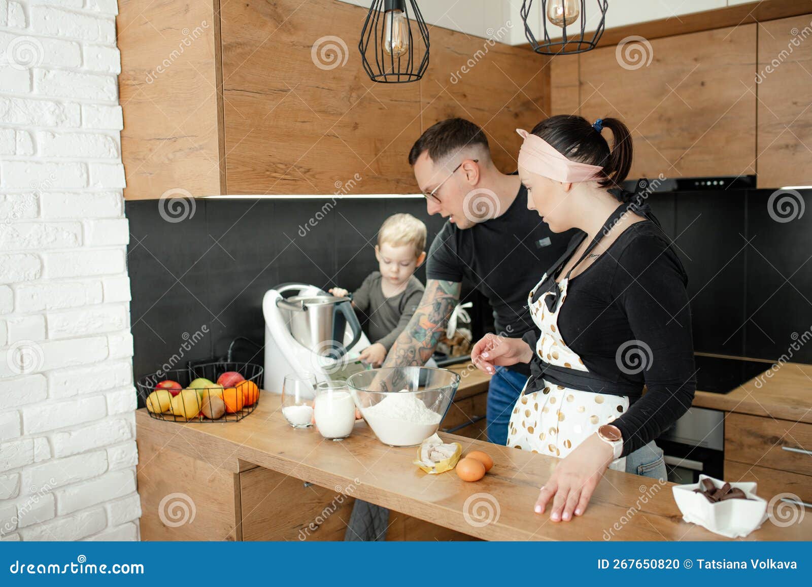 Family from Three People Together Cook Dinner in Kitchen, Side View