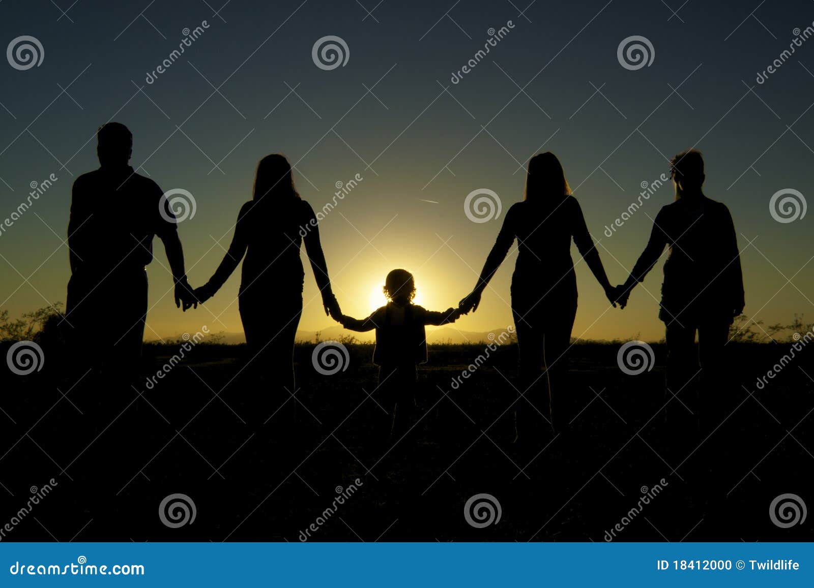 family togetherness and unity in sunset