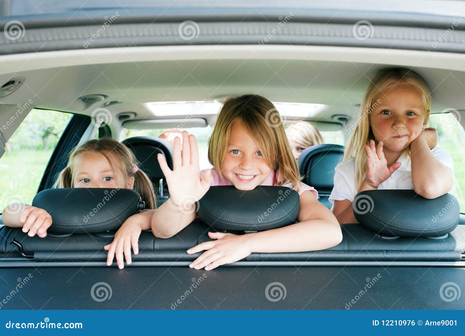 family travelling by car