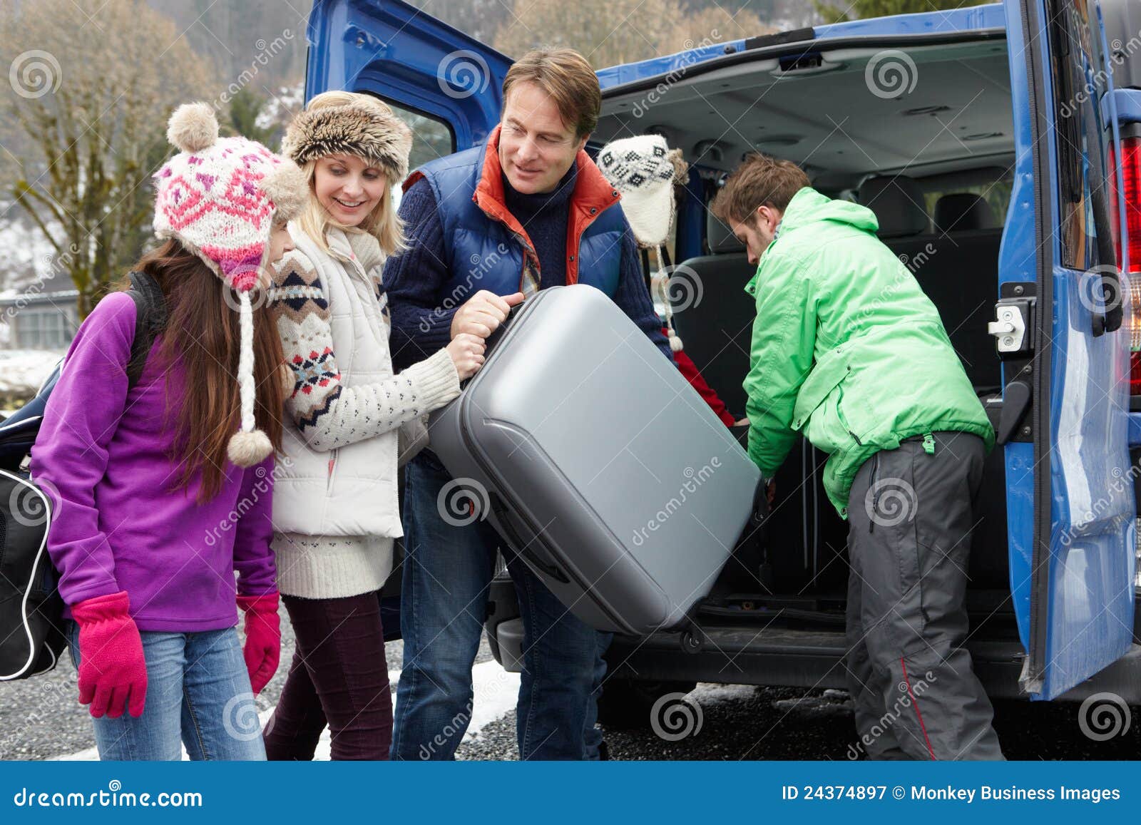 Family Unloading Luggage from Transfer Van Stock Image Image of middle, daughter 24374897