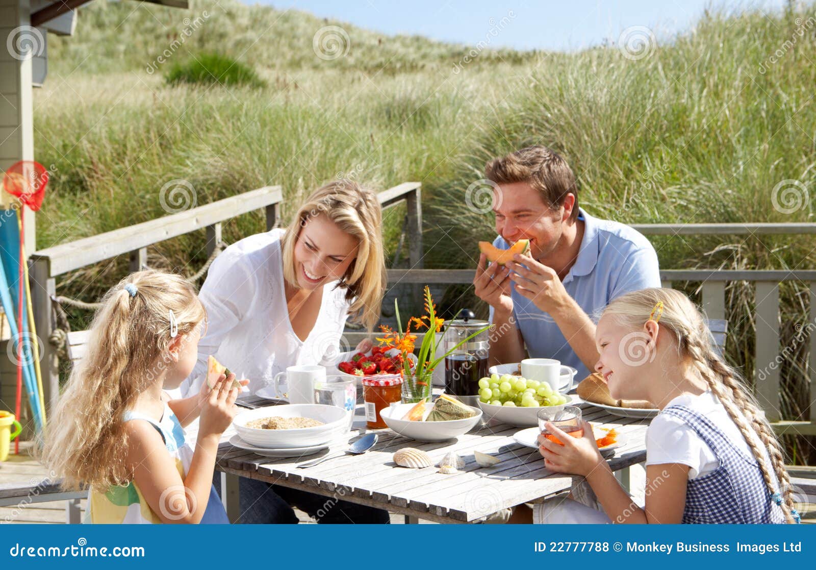 Family On Vacation Eating Outdoors Royalty Free Stock 