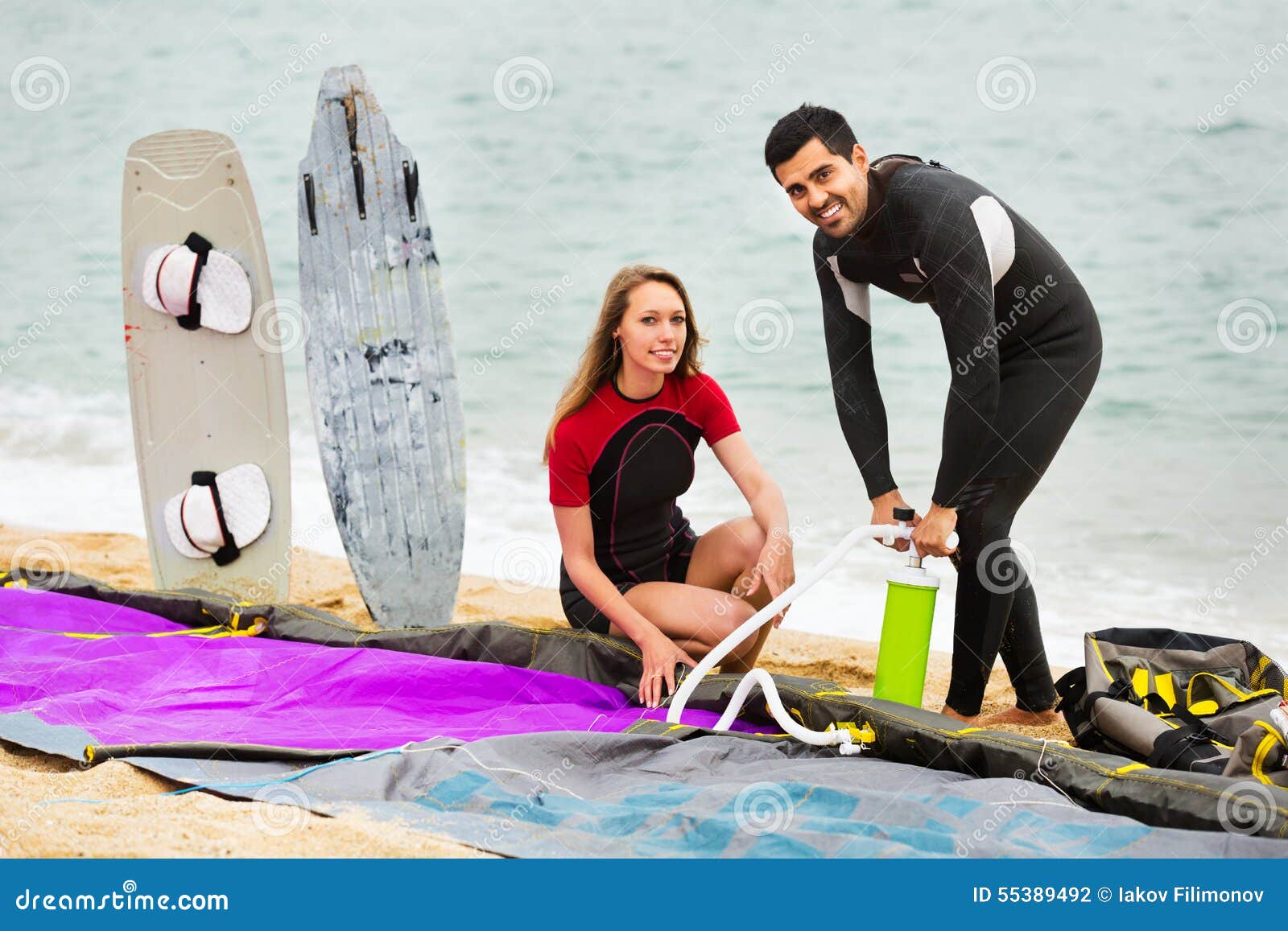 Family in Wetsuits with Surf Boards Stock Photo Image of kiteboard