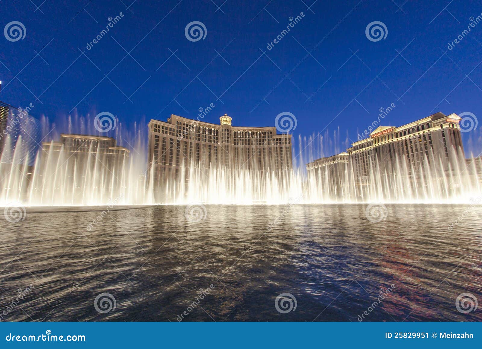 Famous Bellagio Hotel with water. LAS VEGAS - JUNE 15: Las Vegas Bellagio Hotel Casino, featured with its world famous fountain show, at night with fountains on June 15, 2012 in Las Vegas, Nevada.