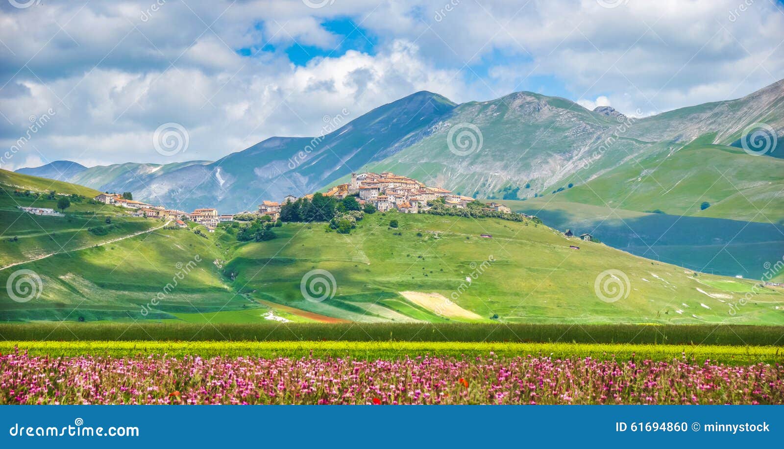 famous castelluccio di norcia with beautiful summer landscape, umbria, italy