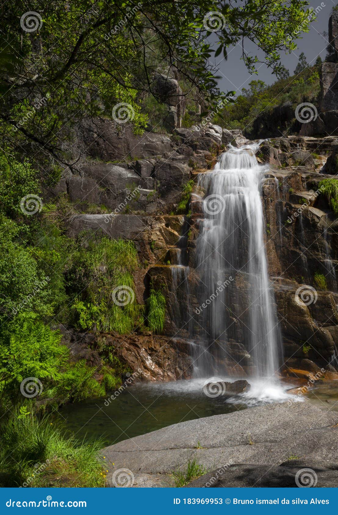the famous `cela cavalos` waterfall in geres national park, minho.