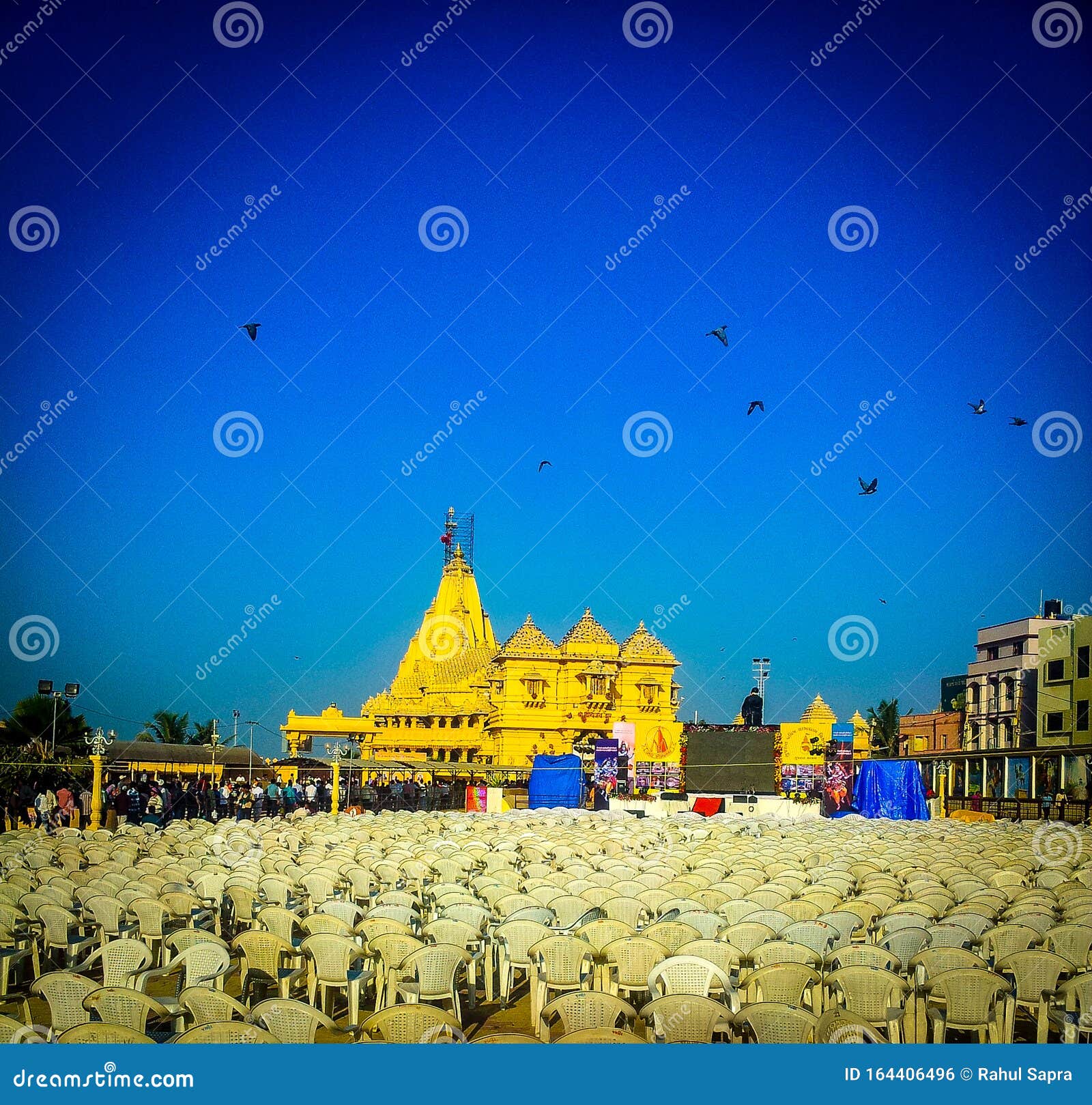 famous full view of somnath temple from outside. somnath temple having lots of plastic chairs