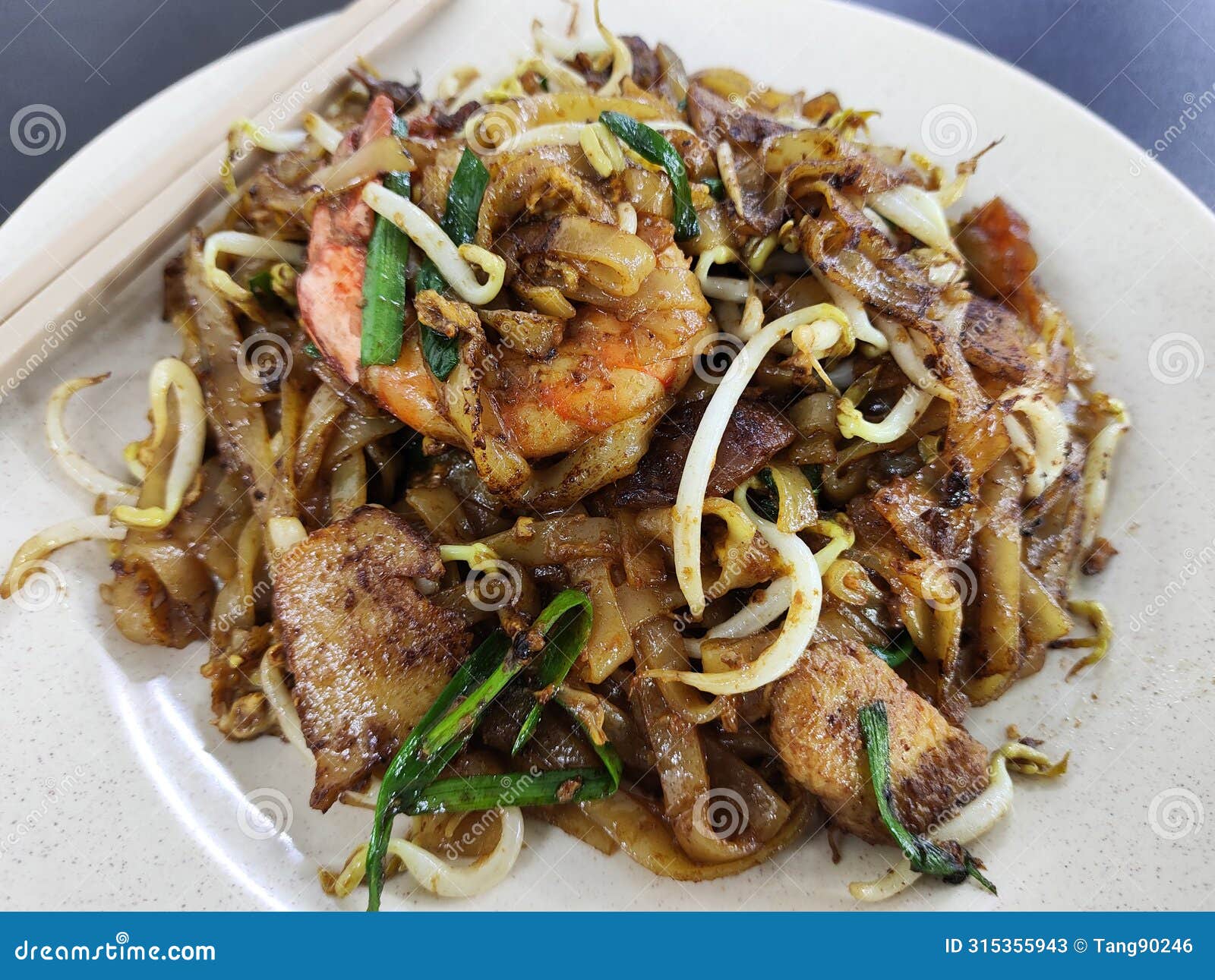 famous penang char kuey teow with prawns