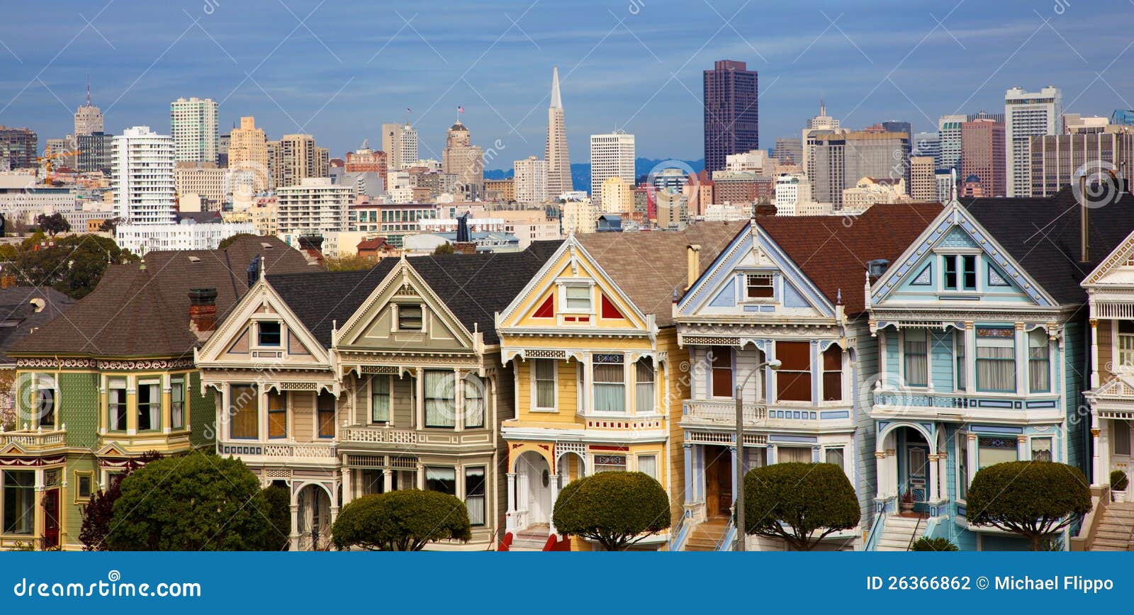 famous row houses in san francisco with skyline